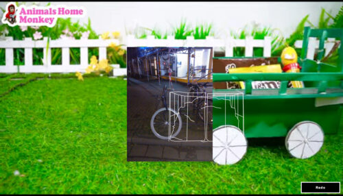 Website showing random elements overlapping each other: A green garden scene in the background, a photo of a bike in a street, and a line art graphic of something else in the foreground. There’s a “Redo” button in the bottom right corner.